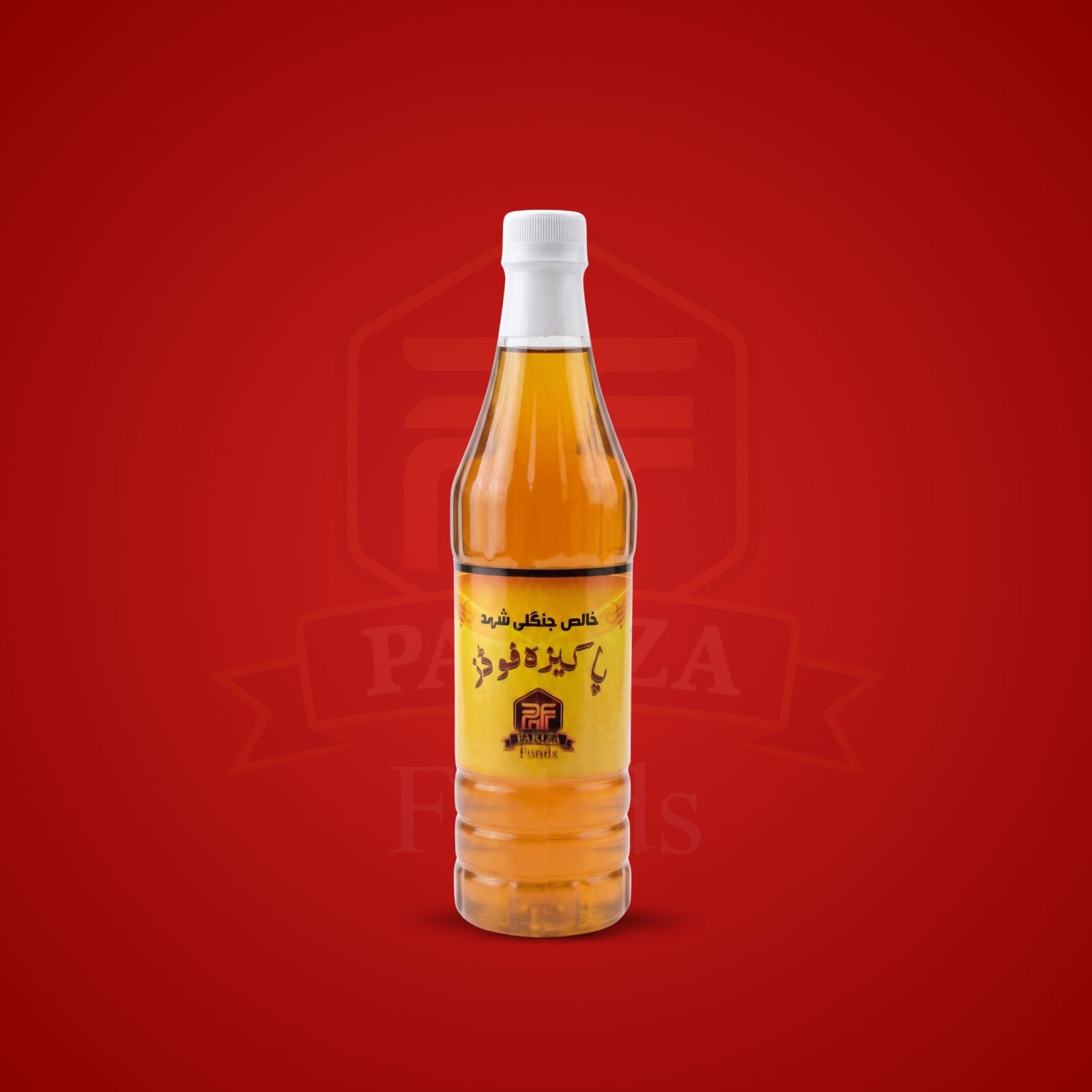 Bottle of Wild Forest Honey, Big bee honey with a yellow label on a red background